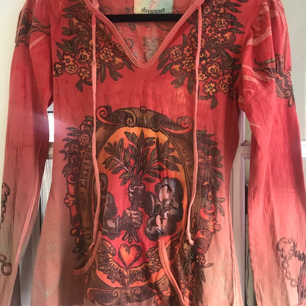 Orange pullover top with hood